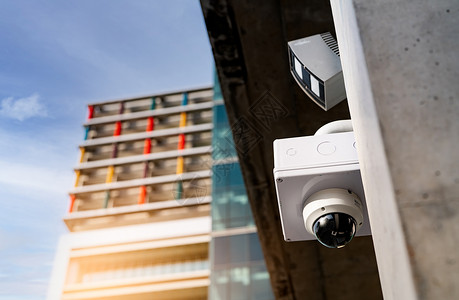 商业预防相机安装在办公楼外的闭路电视监控摄像头频系统闭路电子安全系统警用设备视频监控摄像头技术背景图片