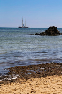 普拉亚大西洋橙葡萄牙阿尔加维的PraiacomBandeiraAzul海滩背景图片