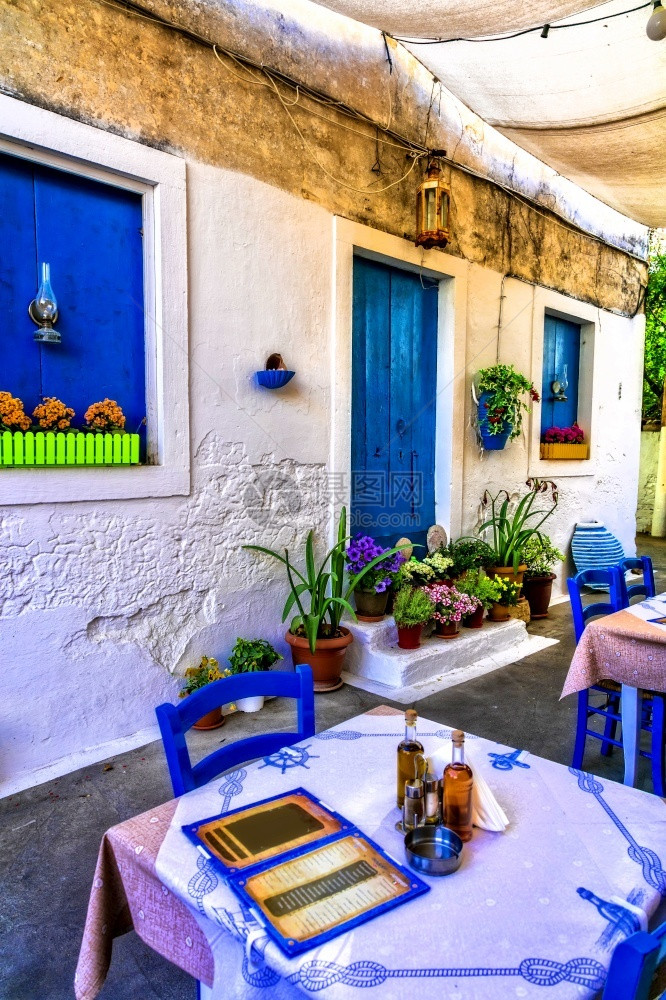 艺术的希腊语复古爱奥尼亚岛和平协会传统塔沃人和平会的典型街头餐馆旅传统希腊塔维尔人和平会图片