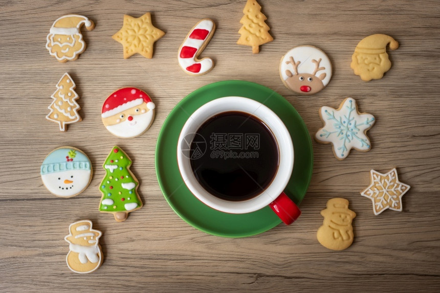 圣诞快乐有自制饼干和咖啡杯在木桌背景的圣诞晚会派对节假日和新年快乐概念黑色的食物饮料图片