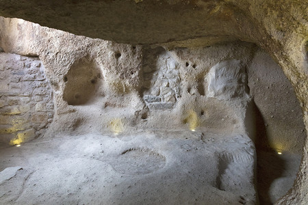 山住宅洞穴房屋卡帕多西亚由希腊人在岩石中切割卡帕多西亚洞穴房屋雕刻在岩石中考古学背景图片