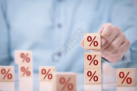费率目标百分比兴趣商人选择顶端的木块上面有百分数符号图标金融概念利率和按揭背景
