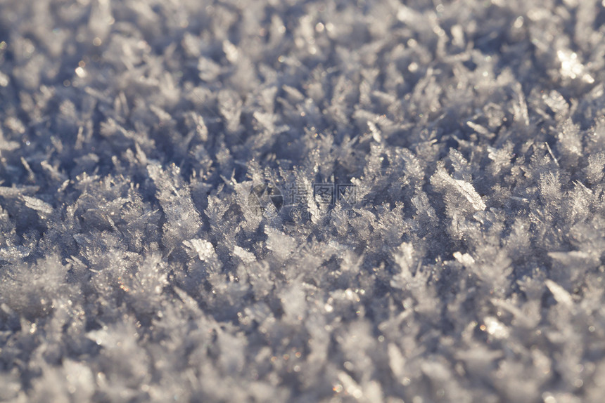 季节以框架中央为焦点浅水深的阳光明媚天气下雪背景寒冬冰雪背景地表冬天幻想拍照图片