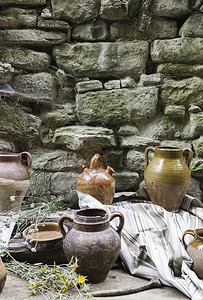 弓旧仓库工具古董关于含有液体传统和古物的泥土细节陶瓷制品新鲜的图片