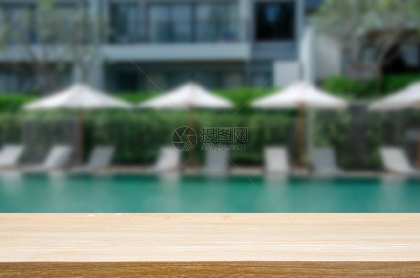 海酒店游泳池桌边的美容豪华椅子可用作展示或装配产品用于展示或调饰您的产品家具日落图片