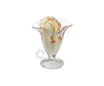 一杯玻璃面粉中的冰淇淋在杯面上的孤立背景冰淇淋上蛋黄酸的餐巾图片