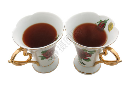 两个老中国茶杯仪式会议款待稀有性棕色白色杯子红色绿色玫瑰背景图片