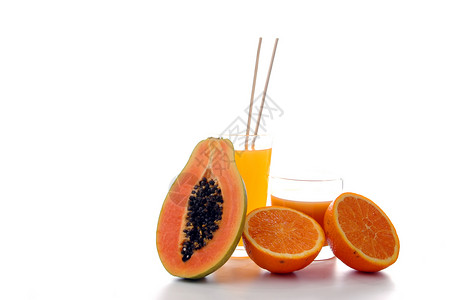 橙汁木瓜木瓜和橙汁食物白色营养橙子奇异果菠萝椰子星星水果热带背景