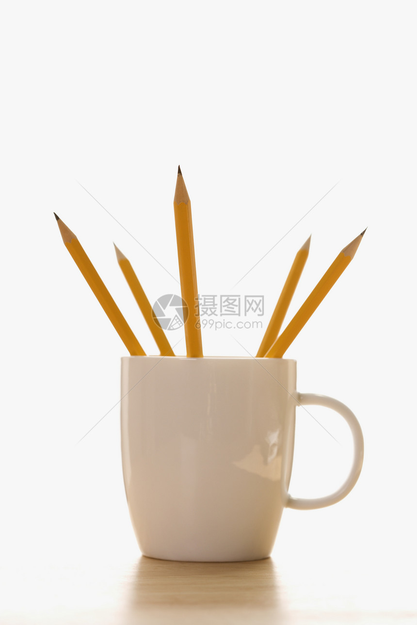 咖啡杯里的铅笔笔筒杯子办公用品办公室商业物体图片