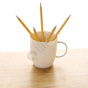 咖啡杯里的铅笔正方形笔筒商业办公室物体办公用品杯子背景图片