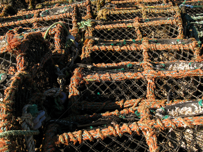 龙虾锅笼子港口渠道渔业浮标渔夫海滩篮子渔民海岸图片