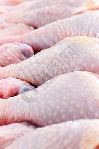 原鸡棒鸡腿杂货店宏观皮肤包装鸟类食物家禽营养烹饪背景图片