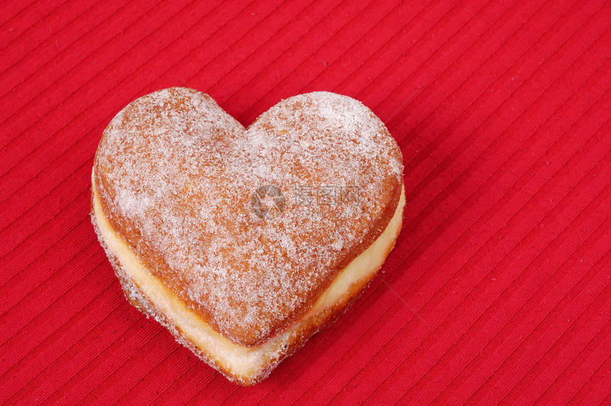 心形圆柱体红色油条小吃甜点专业概念食物糕点图片