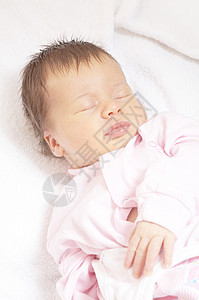 睡睡婴儿轨枕休眠手臂新生女孩背景图片