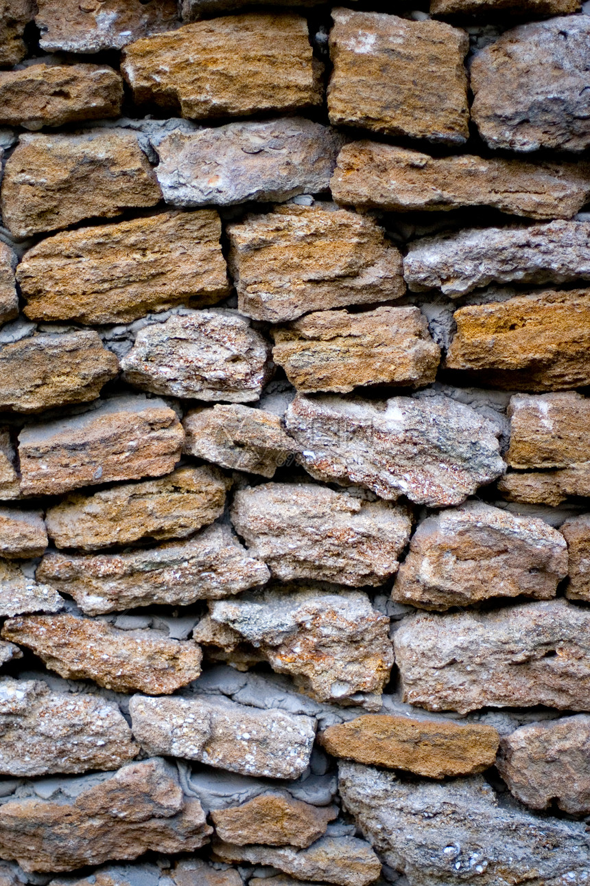 旧石墙石匠鹅卵石建造岩石建筑铺路材料棕色历史建筑学图片