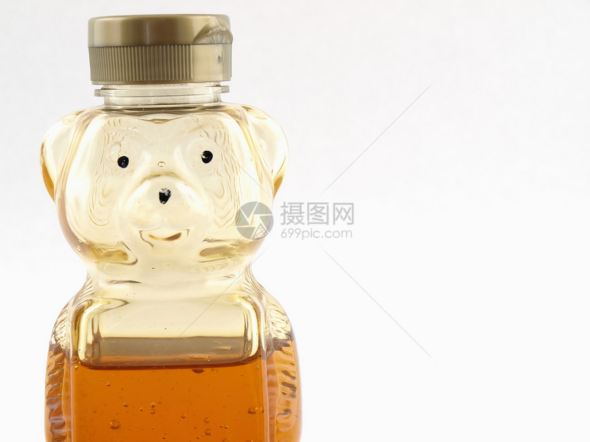半满蜂熊琥珀色瓶子蜜蜂塑料白色图片