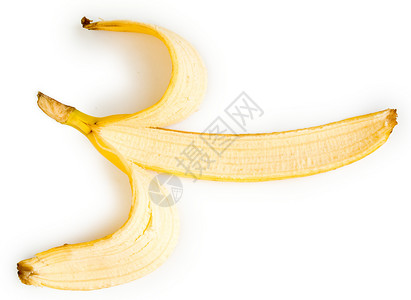 香蕉皮白色热带垃圾植物食物黄色水果背景图片