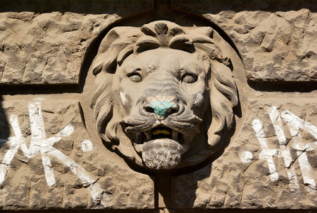 狮子头部的雕塑背景图片