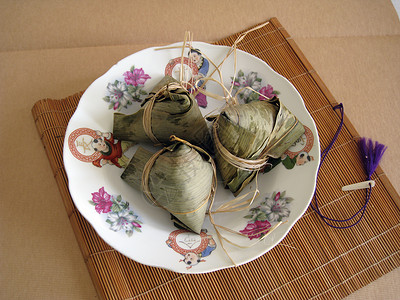 食粮大米盘子节日树叶文化食物国际场合糯米背景图片