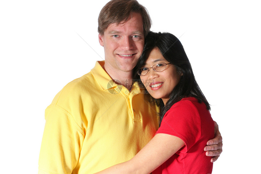 多种族夫妇男性丈夫婚姻微笑妻子喜悦家庭白色拥抱福利图片