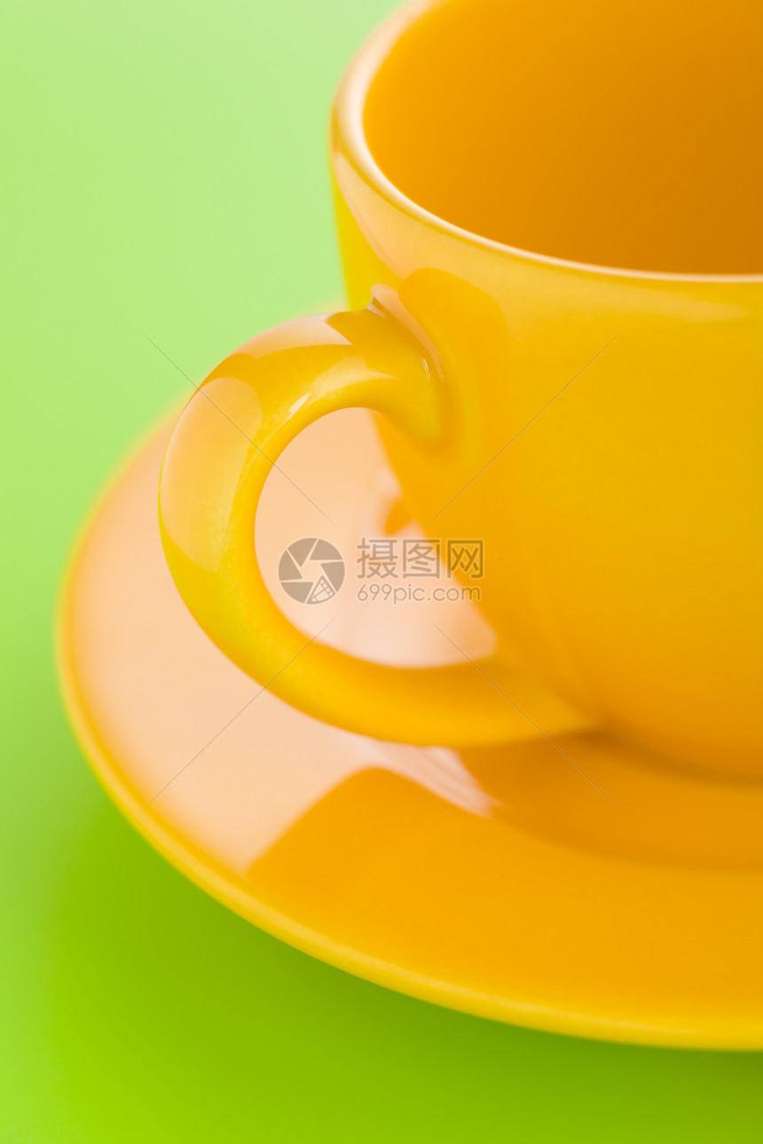黄黄咖啡杯咖啡杯盘子宏观饮料绿色杯子黄色图片