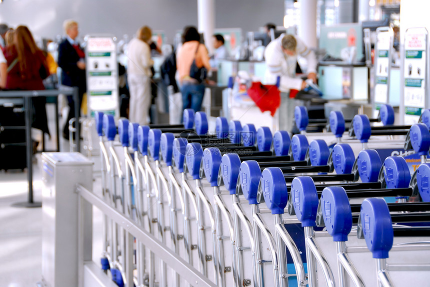 客车机场窗户旅行者国际柜台假期商业空气乘客行李图片