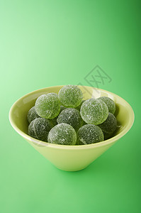 绿色果浆球口味甜点育肥零食水果食物甜心饮食花瓶糖果背景图片