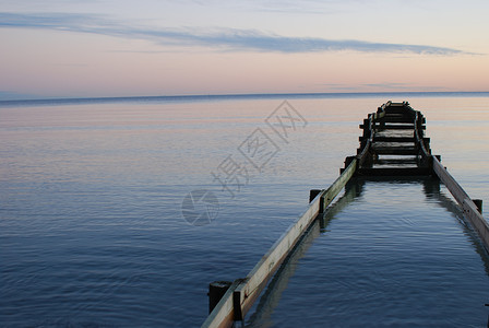 Falsterbo海滩日落蓝色黑色海浪橙子天空太阳高清图片