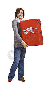带红礼盒的女人奢侈女士牛仔裤惊喜礼物女孩微笑青少年盒子红色背景图片