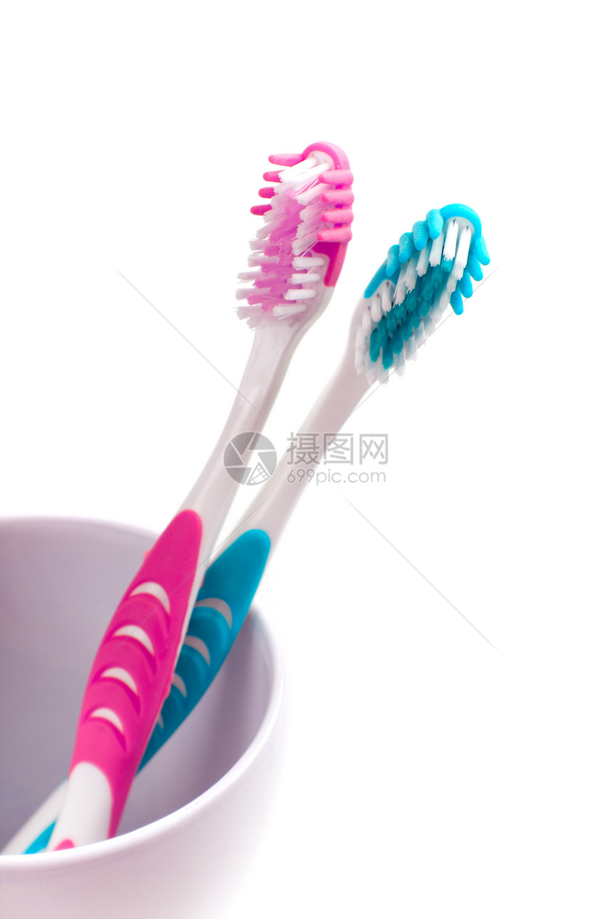 2个牙刷刷子牌匾红色牙科诊所宏观粉色抛光药品矫正图片