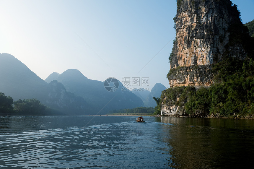 中国的桂林山爬坡岩石假期森林顶峰旅行编队美丽热带巡航图片