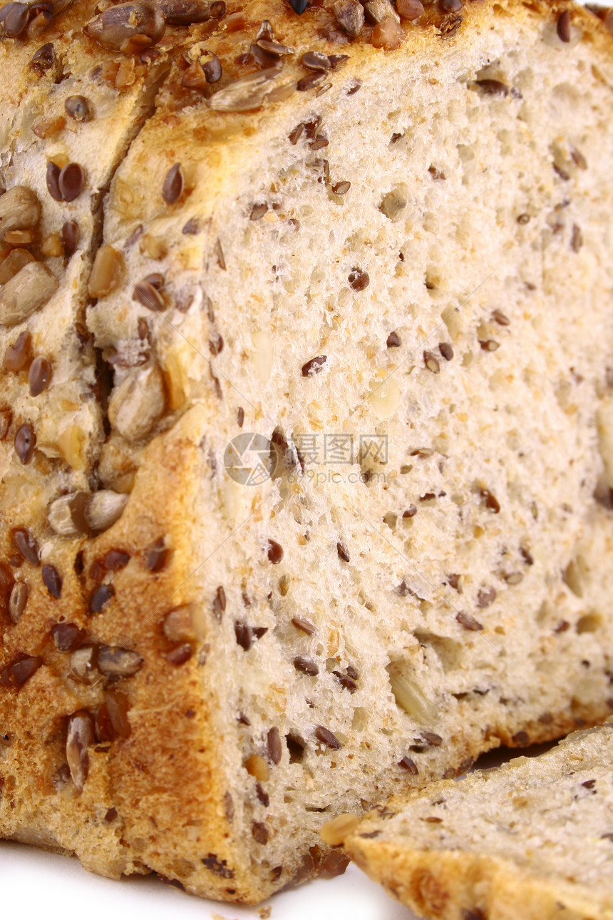 白色背景上孤立的灰色面包条细节种子小麦棕色向日葵面粉脆皮粮食硬皮面团食物图片