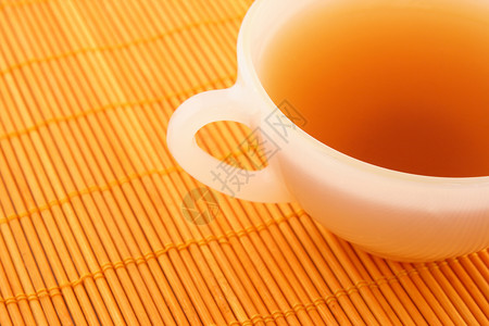 杯茶 橙色大垫上高清图片