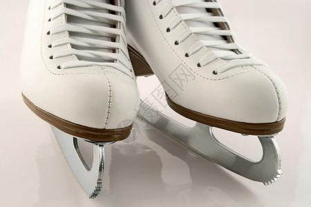 花式滑冰一对白花式溜冰鞋背景