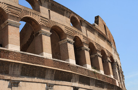 罗马的竞技场天空观光历史世界建筑地标废墟蓝色历史性背景图片