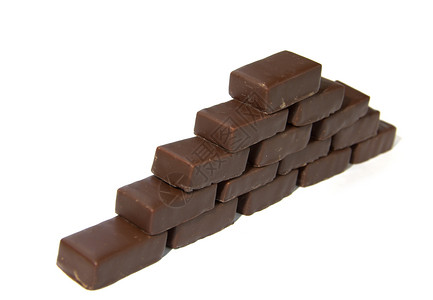 巧克力金字塔甜点食物砖块三角形数字宏观梯子脚步棕色糖果背景图片