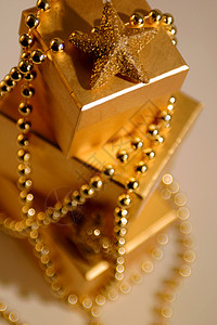 生日礼物庆典盒装包装珠子盒子金子装饰展示背景图片