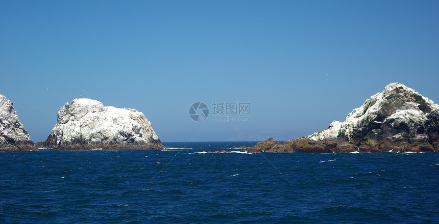 法拉隆群岛加利福尼亚州白色蓝色海洋鸟类鸟粪海浪避难所海豹岩石图片