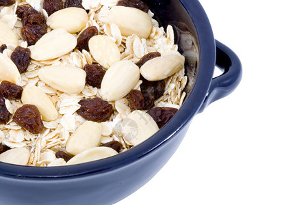 Oatmeal 碗燕麦薄片水果养分稀饭小吃营养白色食物早餐玉米苗条的高清图片素材
