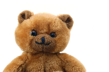 白背景孤立的泰迪熊展示孩子问候语动物玩具熊孩子们玩具生日婴儿棕色背景图片