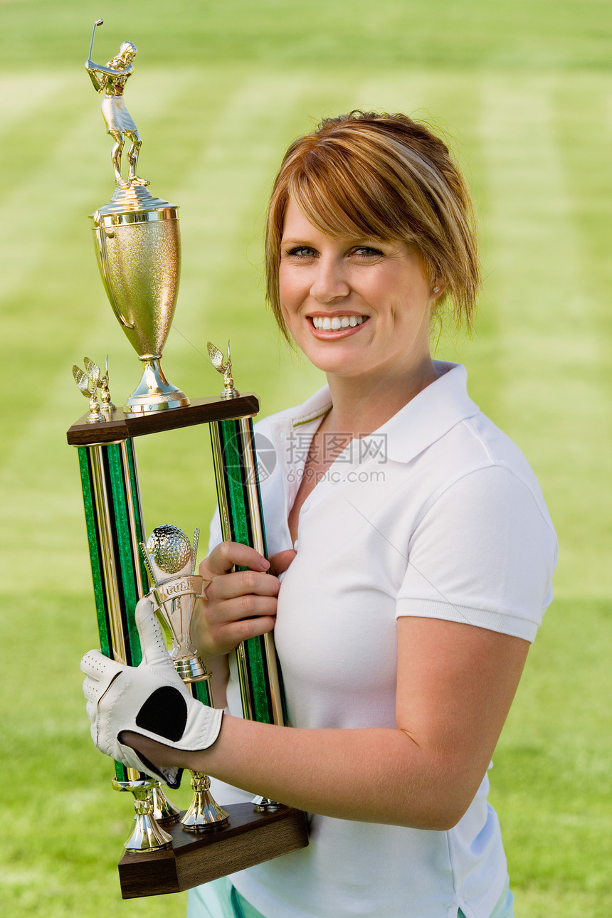 高尔夫冠军奖杯高尔夫球中年闲暇女性图片