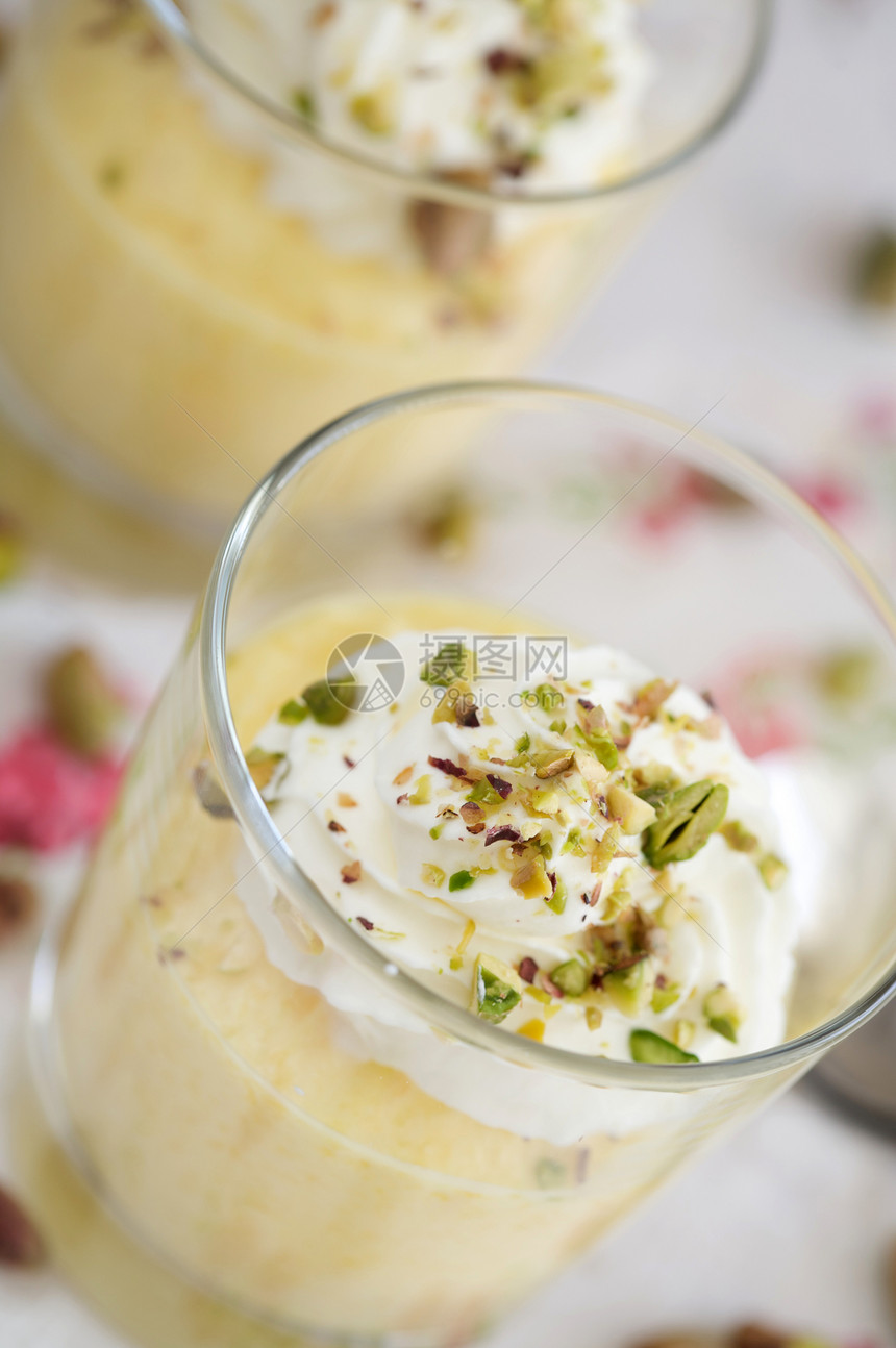 芒果慕斯食物坚果奶制品美食水果奶油烹饪玻璃开心果图片