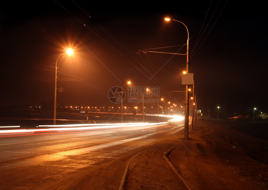 夜间公路车辆街道旅行头灯城市大灯路灯灯光条纹景观图片