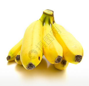 里普香蕉黄色甜点食物水果白色热带背景图片