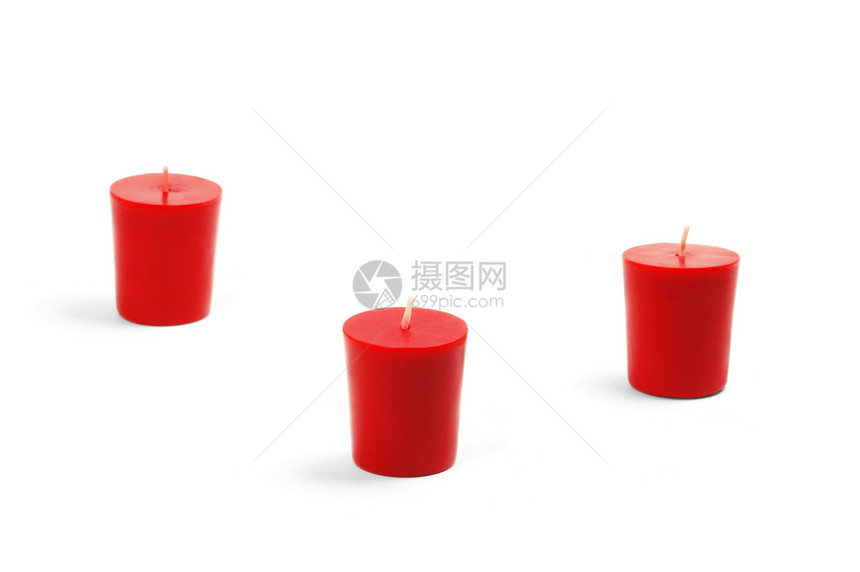 三根蜡烛持有者橙子烛台烛光黄色辉光红色情绪白色黑暗图片