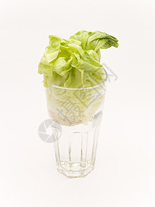 有玻璃的生菜植物食物营养素杯子颜色绿色沙拉农业蔬菜背景图片