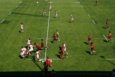 橄榄球胜利运动球员挑战椭圆形游戏体育场男人团体球赛背景图片