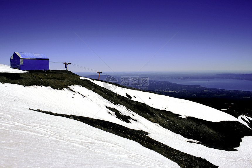 智利莱克区滑雪板全景太阳地平线登山者天空滑雪普孔森林爬坡图片