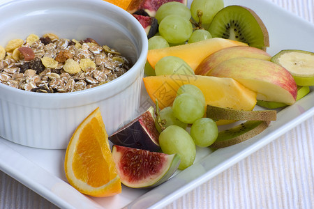 健康早餐谷物玉米营养玉米片白色薄片橘子饮食小吃橙子背景图片