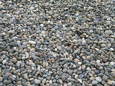 小卵石背景自然石头音调鹅卵石灰色海岸岩石圆形海滩背景图片